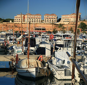 The Port Adriano hotel looks out over the small harbour of the same name
